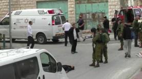 המחבל שוכב על הקרקע, רגע לפני שנורה על ידי החייל, צילום: צילום מסך: באדיבות בצלם