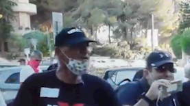 אמיר השכל מתעמת עם שוטרים, צילום: צילום מסך קשת 12