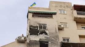 פגיעה ישירה בבניין באשקלון, צילום: פלאש 90/ יוסי זמיר