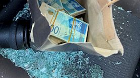 הכסף שנתפס בגניבת הרכב, צילום: דוברות משטרת ישראל