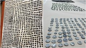 המטבעות העתיקות שנתפסו בבית ביריחו, צילום: דוברות המשטרה