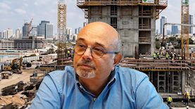 שמאי המקרקעין והמשפטן ארז כהן, צילום: מריו לוי