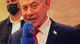 נתניהו עם מיקרופון ערוץ 16, צילום: מסך